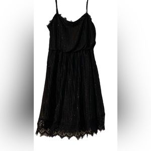 Fire Los Angeles black sparkly cocktail dress with lace at hem and neckline.